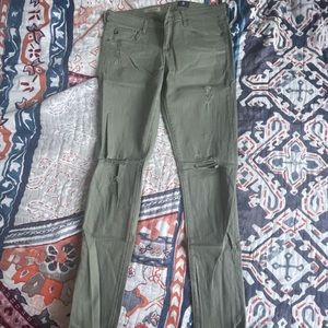 AG ripped skinny jeans.